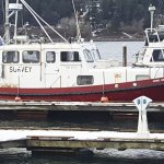 A 40-foot boat was towed to Suldan&rsquo;s Boat Works in Port Orchard after it was found aground with its engine running and no one aboard. The suspected boat pilot was found dead on the north shore of Sinclair Inlet this morning. Photo by Robert Zollna
