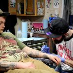 Paul Weaver starts work on Luke Bendorf&rsquo;s tattoo on Valentine&rsquo;s Day at The Clinic Tattoo.                                Michelle Beahm / Kitsap News Group