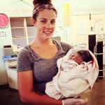 Ellen Yates Barnard with the baby of someone for whom she was a doula, while Barnard was volunteering at a birthing center for a month in Zimbabwe in Africa.                                Photo courtesy Ellen Yates Barnard