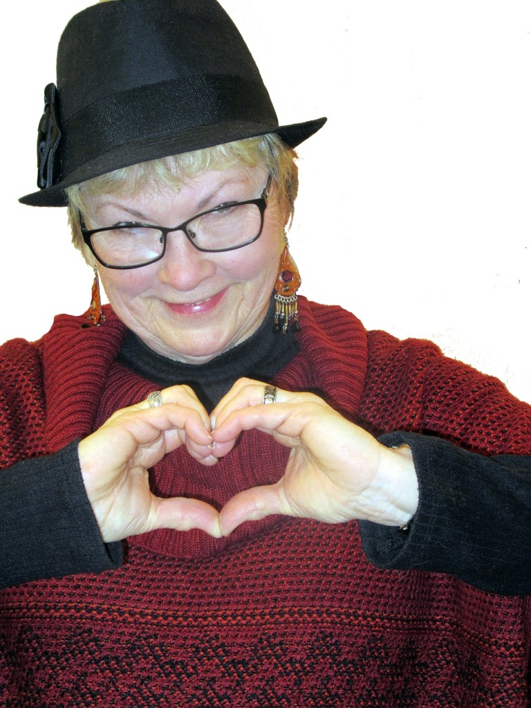 &ldquo;Keep it simple,&rdquo; says Port Orchard artist Shelly Wilkerson, demonstrating the proper way to express your love in a selfie.