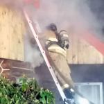 A Poulsbo couple was displaced Feb. 5 by a fire, but their 70-year-old log home was saved. (Jody Matson/Poulsbo Fire Department)