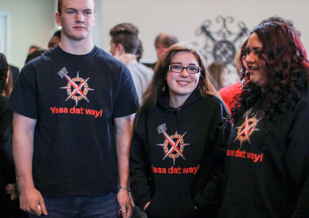 From left, Hunter Schaap&rsquo;s friends, Ryan Brooks, Nassyaha Dahl and Paige Notah wear T-shirts and hoodies honoring Schaap, Feb. 7 at GracePoint Church in Bremerton. Notah designed the ciothing items. Sophie Bonomi / Kitsap News Group