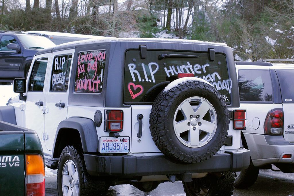 A vehicle is decorated in written tributes to Hunter Schaap, Feb. 7 at GracePoint Church in Bremerton. Sophie Bonomi / Kitsap News Group