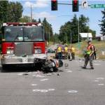 The scene of the fatal crash between a NKF&R fire truck and a Yamaha scooter, July 4, 2014, in Kingston. File photo