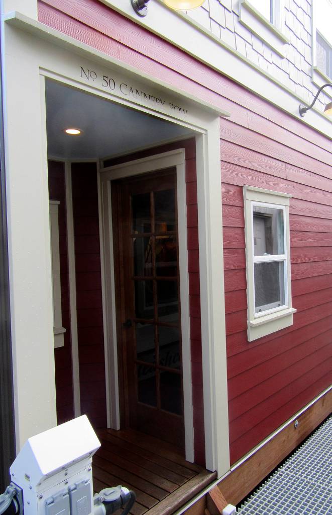 This fashionable boathouse with siding and shingles even sports the address &ldquo;No. 50 Cannery Row&rdquo; above the entrance.                                Terryl Asla/Kitsap News Group