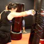 Classes at iLoveKickboxing are high energy, high intensity workouts, which up to about 30 people can participate in at a time. Throughout the classes, instructors go around helping people correct their form and encouraging them to keep pushing.                                Michelle Beahm / Kitsap News Group