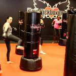 Classes at iLoveKickboxing are high energy, high intensity workouts, which up to about 30 people can participate in at a time. Throughout the classes, instructors go around helping people correct their form and encouraging them to keep pushing.                                Michelle Beahm / Kitsap News Group