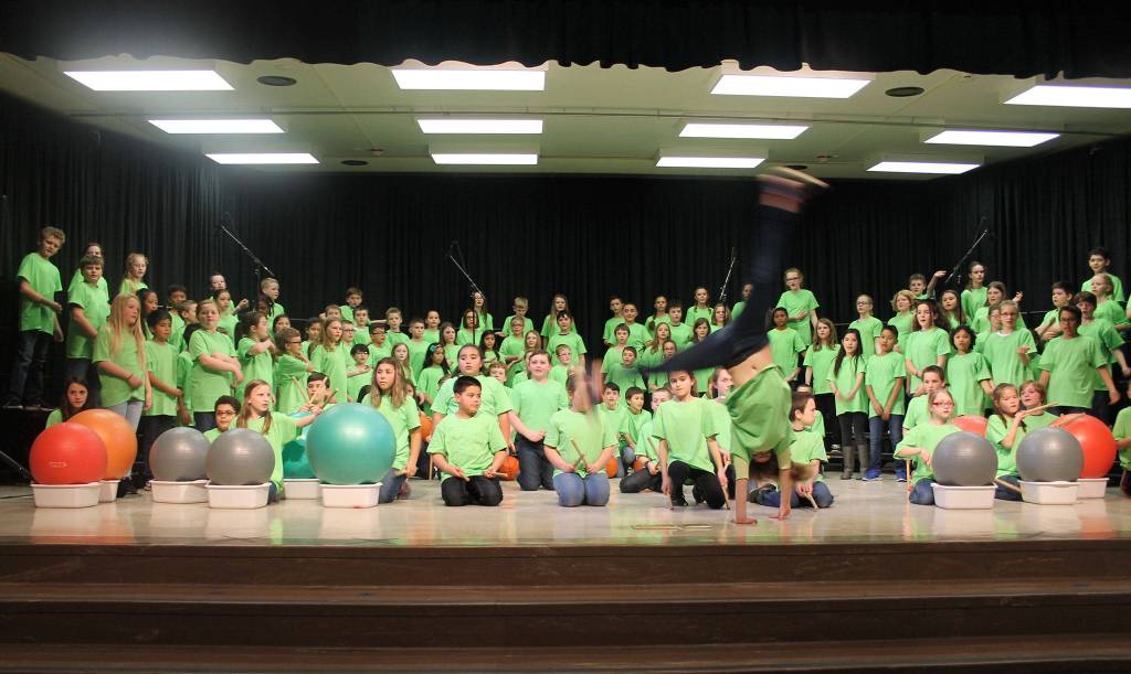 &ldquo;Seize the Day&rdquo; tumbler is 14 year-old Brownsville graduate Annika Collier who also helped the students choreograph their dances.                                Terryl Asla/Kitsap News Group