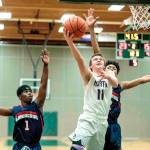 Viking sophomore Cooper Lindsey goes for the shot in the Vikings game against Lindbergh Feb. 15. (Harry McConnell / Contributed)