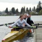 Girls pushing off the dock before their race on Lake Stevens. Line up (from front to back): Allison Burns (14, CKHS), Robbi Koenen (17, SKHS), Addie Talbot (17, CKHS Running Start), Anna Moore (16 CKHS), Elizabeth Simmons (18, KSS). Dane Sellers/Clam Island Rowing club