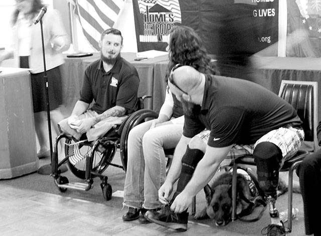 Even with a prosthetic leg, you still have to re-tie your shoelaces sometimes. (Terryl Asla/ Kitsap News Group)