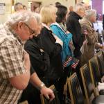 Active-duty personnel, veterans, families and friends showed their deep respect and love of country when the National Anthem was sung by Naomi Bentz. Some veterans put their hands over their hearts, some saluted, one openly was moved to tears. (Terryl Asla/ Kitsap News Group)