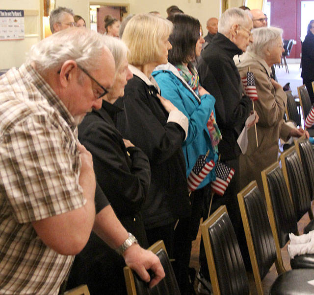 Active-duty personnel, veterans, families and friends showed their deep respect and love of country when the National Anthem was sung by Naomi Bentz. Some veterans put their hands over their hearts, some saluted, one openly was moved to tears. (Terryl Asla/ Kitsap News Group)