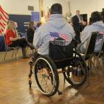 Homes for Our Troops executive director Bill Ivey, center, explains the nonprofit&rsquo;s goals and what local residents can do to help support the program, which has provided more than 200 wounded warriors nationwide with mortgage-free homes designed to meet their special needs. (Terryl Asla/ Kitsap News Group)