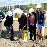 Ceremonial shovel turn at the Klahowya Seconary School improvement project groundbreaking April 14.                                Michelle Beahm / Kitsap News Group