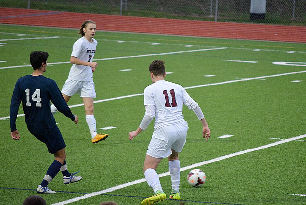 Senior captain Jacob Ostrowski taking on a defender. Ostrowski had several close opportunities during the game.