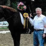 Mary Craft (on horse) is a Century Award recipient this year. Herman Aguayo (left) is a past Century Award recipient. At right is Shannon Lockwood, trainer and coach. Photo credit: Courtesy photo