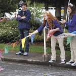 A tiny participant needs a little encouragement at the finish line last year at the Seagull Splat 5K race in Port Orchard. The little competitor took part in a children&rsquo;s race. File photo.