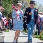 Community members cheer as Ardis Morrow and Bill Austin arrive at Kvelstad-Austin Pavilion in downtown Poulsbo for a celebration honoring their contributions to the community, in 2015. The two will again be honored on May 20 when they serve as grand marshals of the 2017 Viking Fest Parade. (Sophie Bonomi/2015)