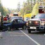 A car and a pickup truck collided shortly before 5 p.m. in the southbound lane of Highway 305, May 22. A Lemolo man said he was driving &ldquo;traffic speed at best&rdquo; but believes he passed out from fatigue and heat. When he came to, he said, his car had crashed into a pickup truck and then a guardrail. (Richard Walker/Kitsap News Group)