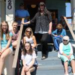 Friendly Quilt Shoppe owner Beatrice MarX (center) not only let people camp on her grass, she let them sit on her front porch, too.