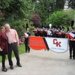 Principal Coons and his wife pose with the band. Terryl Asla/Kitsap News Group