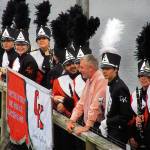 Central Kitsap High School Principal Stephen Coons is greeted by members of the school band on his home&rsquo;s pier, May 18. Terryl Asla / Kitsap News Group