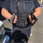 A Bremerton Police officer took this picture. Which handgun is real? Which one is a replica? What if your life depended on making the right choice? (Bremerton Police Department)