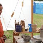 An SCA member demonstrates pottery making using period-appropriate techniques.                                Michelle Beahm / Kitsap News Group
