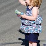 A future princess waves to the Fathoms O&rsquo; Fun&rsquo;s royal court aboard their float. Photo credit: Bob Smith | Kitsap Daily News