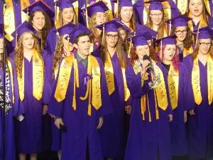 The North Kitsap High School choir sings during commencement June 9 at North Kitsap Stadium. (Angie Donovan/Kitsap News Group correspondent)