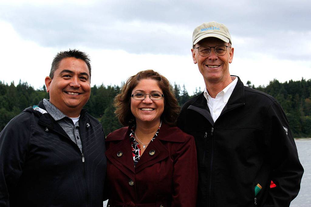 From left, Port Gamble S&rsquo;Klallam Tribe Chairman Jeromy Sullivan, Ecology Director Maia Bellon, and Pope Resources president and CEO Tom Ringo, June 8 at the celebration of the cleanup of the former Port Gamble mill site and nearshore. (Sophie Bonomi/Kitsap News Group)