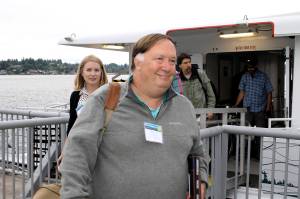 Rick McPherson, a lecturer of management at University of Washington, exits the fast ferry in Bremerton as part of a two-day study mission co-sponsored by the Seattle Metropolitan Chamber of Commerce. (Mark Krulish/Kitsap News Group)