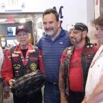 The Suquamish Tribe presents a model of a Coast Salish canoe to the Poulsbo Maritime Museum, July 14. (Ian A. Snively/Kitsap News Group)