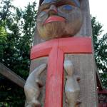 A house post depicting Chief Si&rsquo;ahl, or Seattle, leader of the Duwamish and Suquamish nations in the 1800s, looks out over the House of Awakened Culture where canoes from several Coast Salish nations visited July 20 during the 2017 Canoe Journey. Canoe families are traveling to We Wei Kai and Wei Wai Kum First Nations territory at Campbell River, B.C. (Richard Walker/Kitsap News Group)
