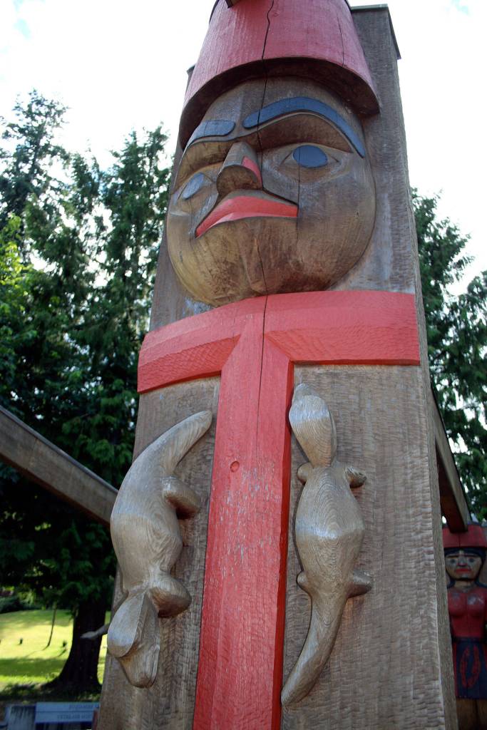 A house post depicting Chief Si&rsquo;ahl, or Seattle, leader of the Duwamish and Suquamish nations in the 1800s, looks out over the House of Awakened Culture where canoes from several Coast Salish nations visited July 20 during the 2017 Canoe Journey. Canoe families are traveling to We Wei Kai and Wei Wai Kum First Nations territory at Campbell River, B.C. (Richard Walker/Kitsap News Group)