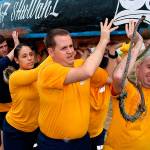 Sailors from Naval Base Kitsap carry a canoe to the lawn outside the House of Awakened Culture, July 20, during the 2017 Canoe Journey. Canoe families are traveling to We Wei Kai and Wei Wai Kum First Nations territory at Campbell River, B.C. Suquamish was an early stop for Puget Sound indigenous nations traveling in the annual gathering of Northwest canoe cultures. (Richard Walker/Kitsap News Group)