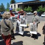 Protestors line up outside the Kitsap County Administration Building and Courthouse before a district court mitigation hearing. Photo: Bob Smith | Kitsap Daily News