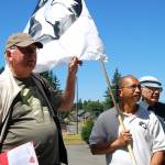 Left to right: Cliff Kirchmer, Ray Nacanaynay and Jim Brecht await others to join up for their march from the Givens Community Center to the Kitsap County Administration Building and Courthouse. Photo: Bob Smith | Kitsap Daily News