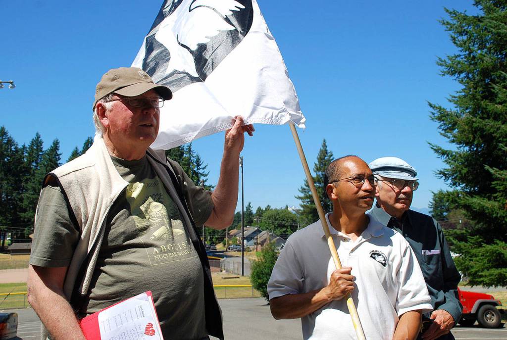 Left to right: Cliff Kirchmer, Ray Nacanaynay and Jim Brecht await others to join up for their march from the Givens Community Center to the Kitsap County Administration Building and Courthouse. Photo: Bob Smith | Kitsap Daily News