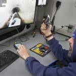 The crumbling sewer main was discovered as part of Poulsbo Public Works ongoing project to inspect and map the condition of all of the city&rsquo;s sewer and stormwater pipes. Here, a city employee drives a remote camera robot down a small residential sewer line.                                Terryl Asla/Kitsap News Group