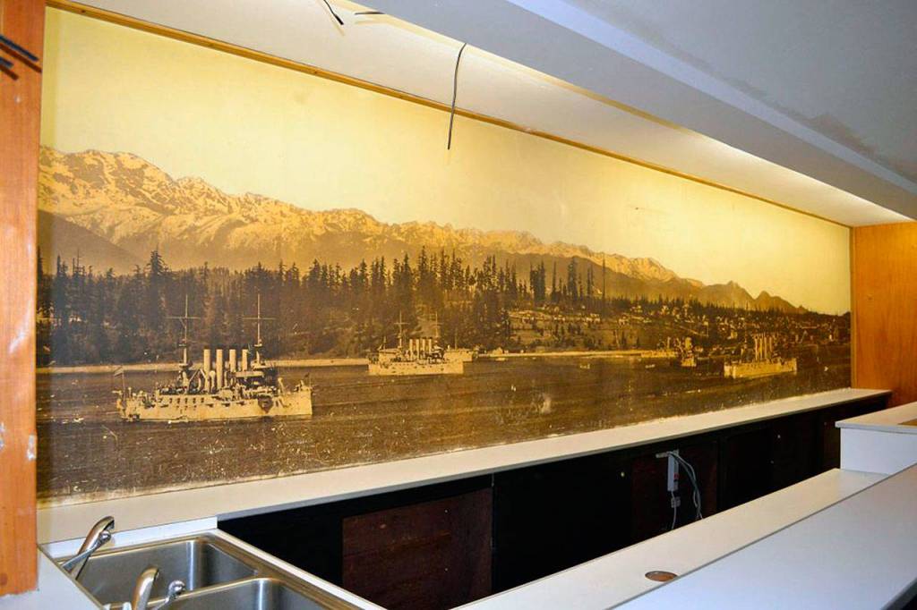 Still in the theater is Asahel Curtis&rsquo; 35-foot photographic mural depicting the Great White Fleet of 1908 and the Bremerton Navy Yard. It was one of the largest photo murals ever produced in the Pacific Northwest at the time, according to Sound West Group. (Courtesy/Sound West Group)