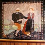 An exquisite tile mural depicting an older couple folk dancing. It, too, once hung in Loretta&rsquo;s Gift Shop and now will become the property of West Sound Group.                                Terryl Asla/Kitsap News Group