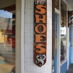 Look carefully: the carved wooden sign advertising the Indigo Plum shoe store is really a holdover from the days when the Sluys had a shoe store on Front Street.                                Terryl Asla/Kitsap News Group