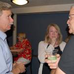 Left, Bremerton City Council member Greg Wheeler visits with supporters at The Toro Lounge, Aug. 1. Wheeler finished first in the primary for mayor. (Bob Smith/Kitsap News Group)