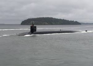 The Ohio-class ballistic-missile submarine USS Kentucky transits the Hood Canal on June 15 as it returns to Naval Base Kitsap, following a strategic deterrent patrol. Defense Secretary Jim Mattis will meet with the submarine&rsquo;s crew during a visit to the base. Petty Officer 1st Class Amanda R. Gray/U.S. Navy