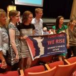 U.S. Rep. Derek Kilmer, D-Gig Harbor, poses with members of Women&rsquo;s March Kitsap at his town hall meeting Aug. 9, in the North Kitsap Auditorium. (Terryl Asla/Kitsap News Group)