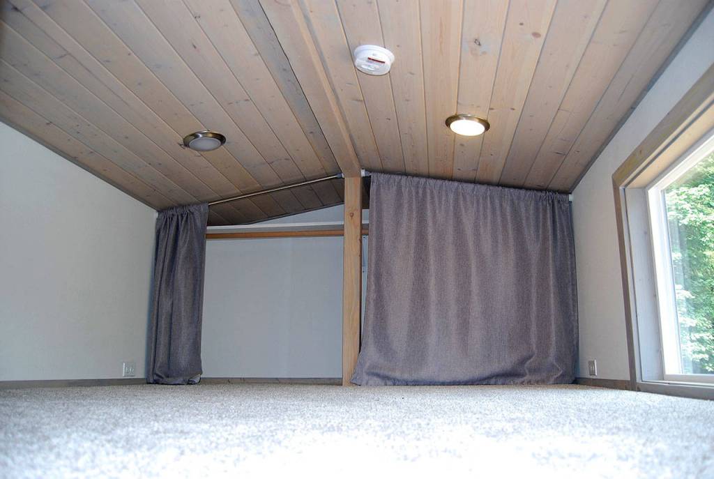A 96-square-foot loft above the kitchen and bathroom can be used as a bedroom. Photo: Bob Smith | Kitsap Daily News