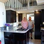 Builders Bob and Cheryl Bretey stand inside the $60,000 tiny home structure they built to demonstrate the value of a minimalist lifestyle. Photo: Bob Smith | Kitsap Daily News