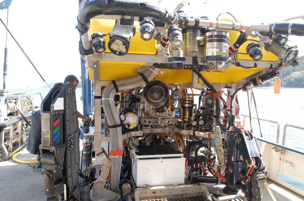 Crews ready the ROV Hercules on Friday for its next dive aboard the EV Nautilus. (Rob Ollikainen/Peninsula Daily News)